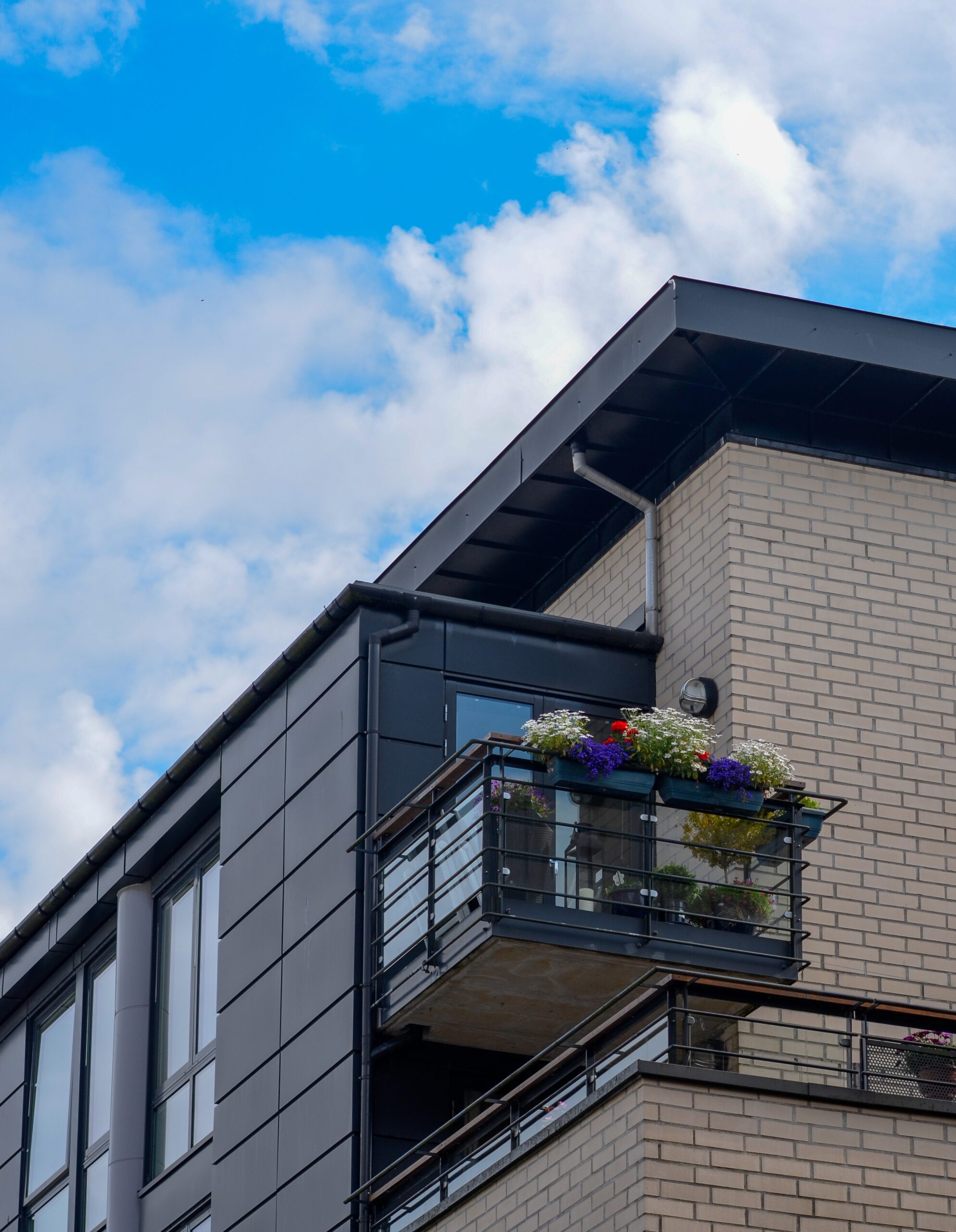 closeup shot of a residential building on background of cloudy sky